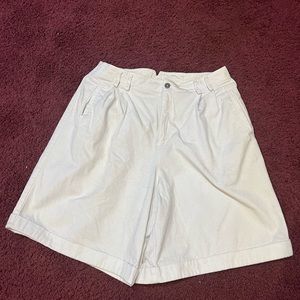 Womens white pleated shorts with one pocket on back that buttons up !